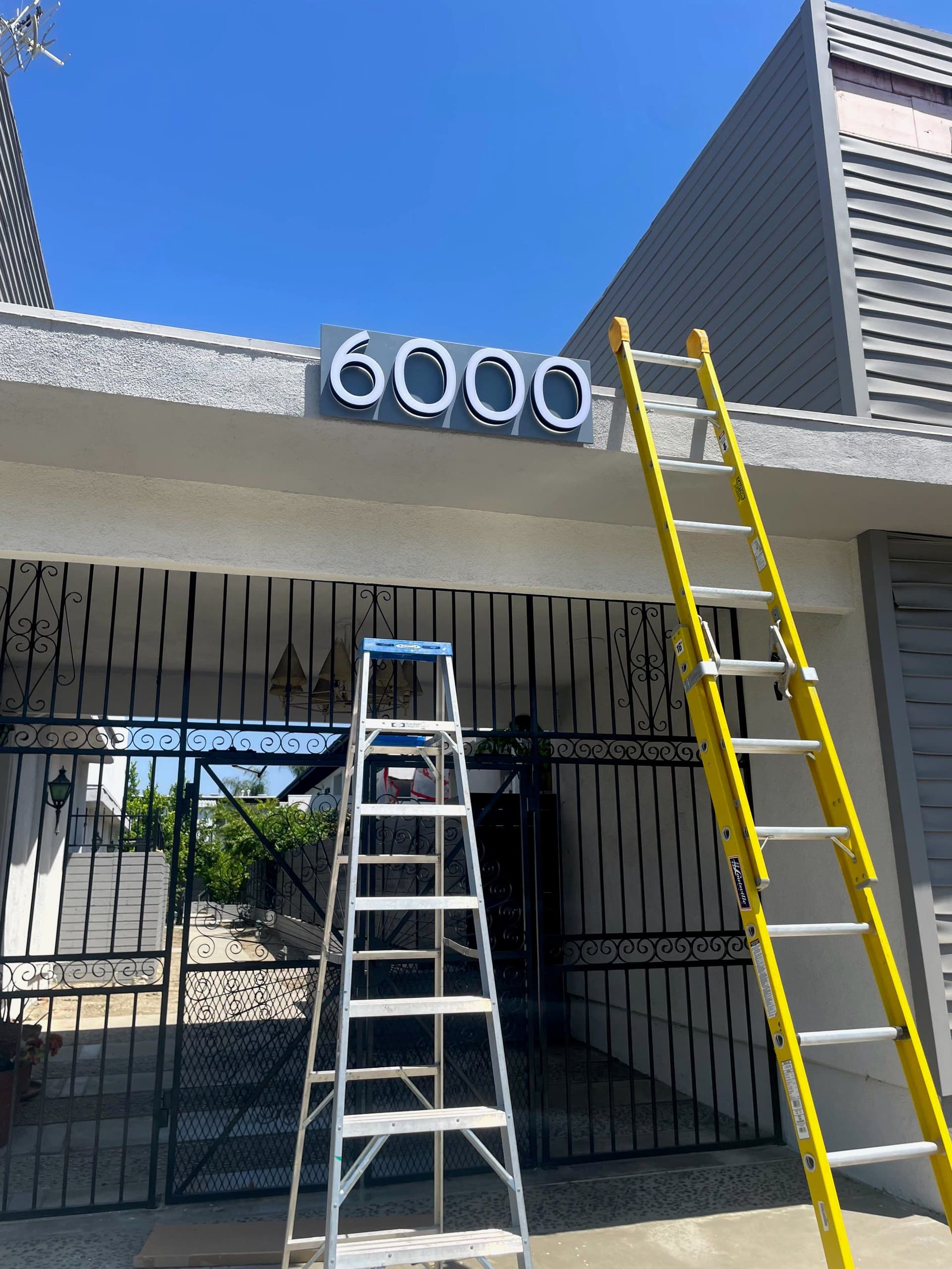 Stylish Address Sign Installation Elevates Building Entryway image